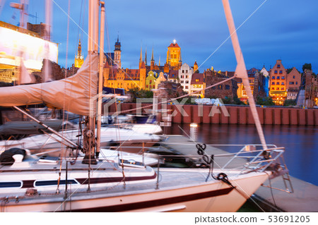 Downtown of Gdansk with boats in harbor during Downtown of Gdansk with boats in harbor during 53691205