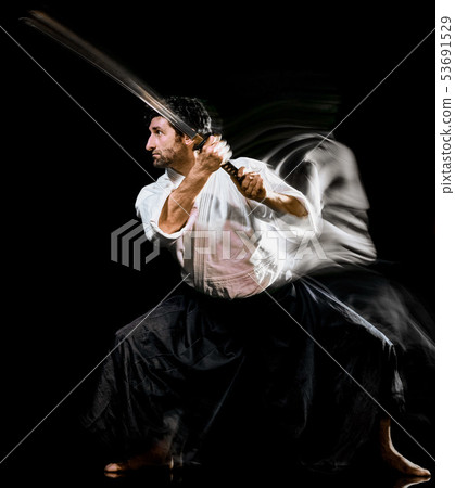 Iaido  Kenjutsu budoka man isolated black background 53691529