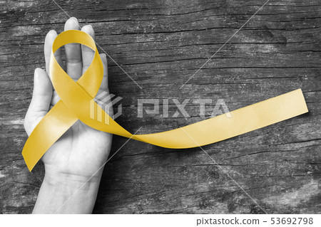 Yellow ribbon symbolic for Sarcoma Bone cancer Yellow ribbon symbolic for Sarcoma Bone cancer 53692798