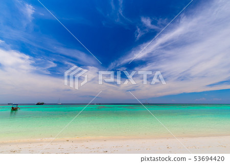 Clear water and blue sky at the paradise island Clear water and blue sky at the paradise island 53694420