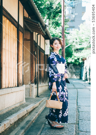 A woman in a yukata A woman in a yukata 53695404