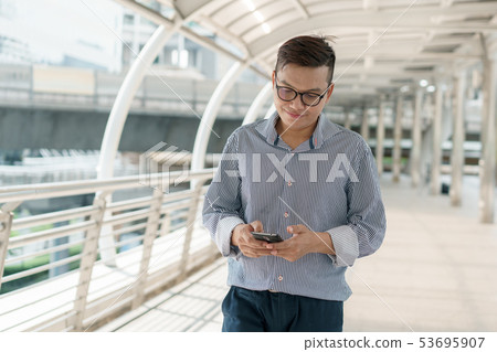Portrait of asian young businessman standing 53695907