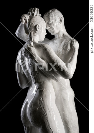 Couple in the nude with white color bodyart 53696323