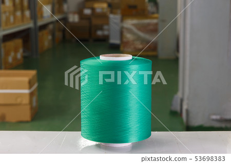 Green thread spool Green thread spool 53698383