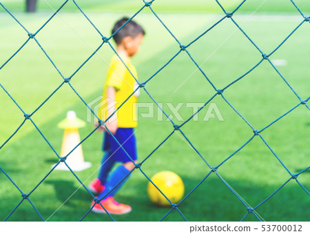 Soccer Academy field for children training blurred Soccer Academy field for children training blurred 53700012