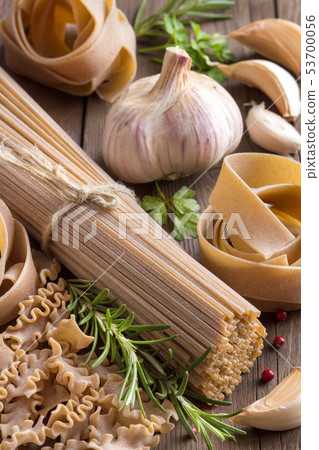 Whole wheat italian pasta with garlic and herbs Whole wheat italian pasta with garlic and herbs 53700056