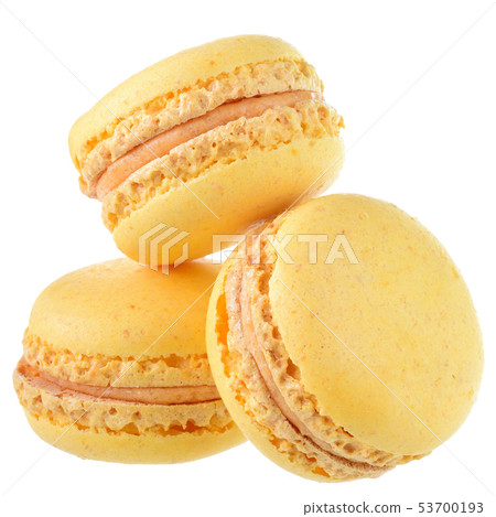 Yellow peach macaroon close up isolated Yellow peach macaroon close up isolated 53700193