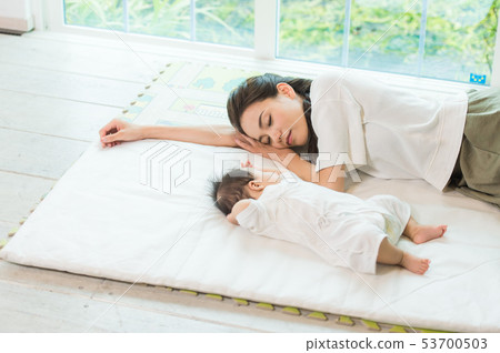 Baby and mother nap Baby and mother nap 53700503