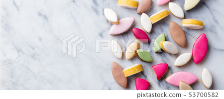 Calissons assortment on marble background. Traditional French Provence sweets. Top view. Copy space. Calissons assortment on marble background. Traditional French Provence sweets. Top view. Copy space. 53700582