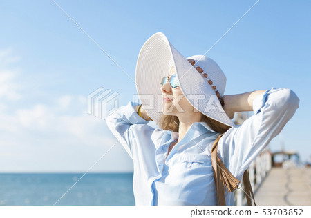Enjoying summer sun Enjoying summer sun 53703852