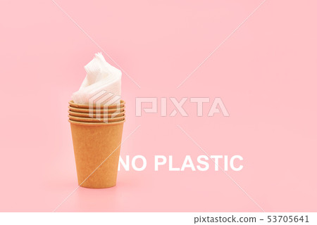 coffee to go in a disposable cup on a white background, ice cream concept, eco friendly cup coffee to go in a disposable cup on a white background, ice cream concept, eco friendly cup 53705641