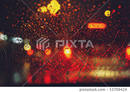 Drops Of Rain Drizzle on the glass windshield Drops Of Rain Drizzle on the glass windshield 53709429