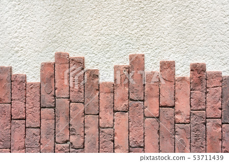 White wall and red brick 53711439