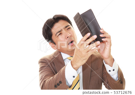 An agonizing businessman with a wallet An agonizing businessman with a wallet 53712676
