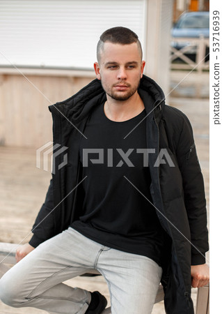 young man with a short hairstyle young man with a short hairstyle 53716939