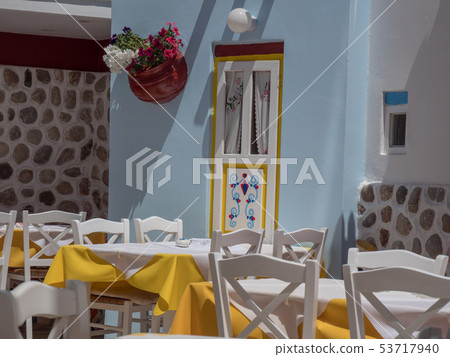 Traditional greek style flower decoration on the street 53717940