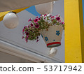 Traditional greek style flower decoration on the street 53717942