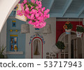 Traditional greek style flower decoration on the street 53717943