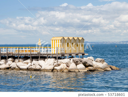 Yellow wooden cabins 53718601
