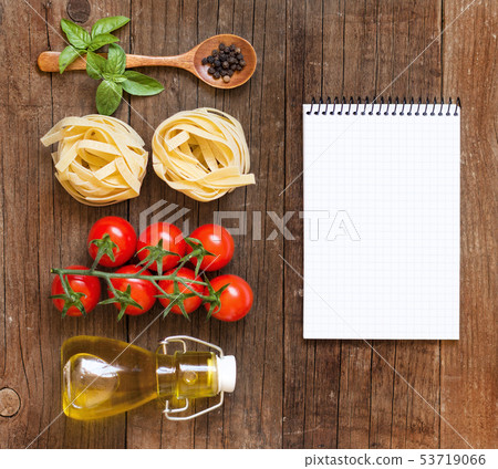 Pasta, vegetables, herbs and notebook on old Pasta, vegetables, herbs and notebook on old 53719066