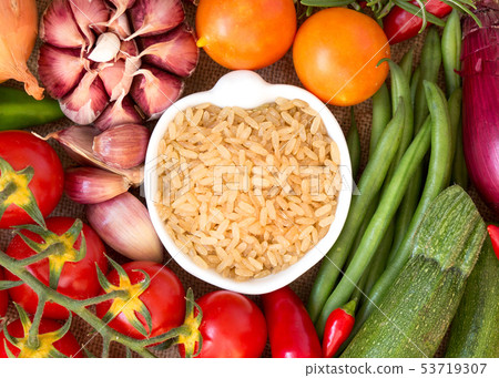 Whole upolished organic rice and vegetables 53719307