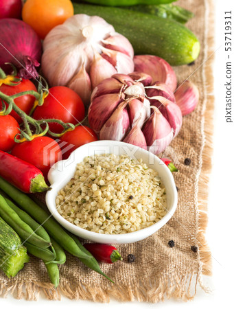 Raw organic hemp seeds and vegetables 53719311