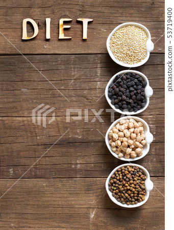 Cereals and legumes in bowls and word Diet 53719400