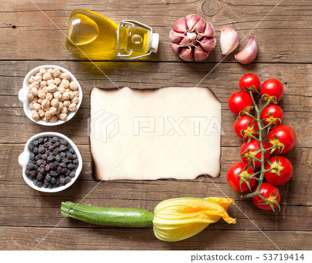 Vegetables and chickpea on a wooden table Vegetables and chickpea on a wooden table 53719414