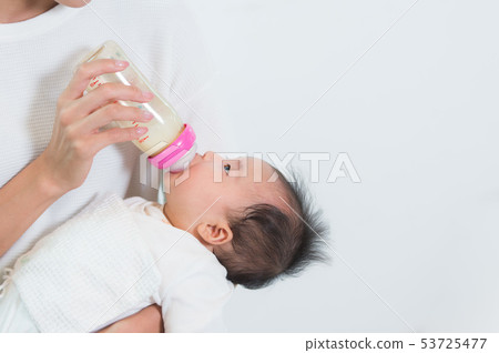 Baby drinking milk Baby drinking milk 53725477
