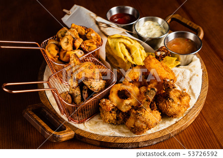 beer plate on the wooden background 53726592
