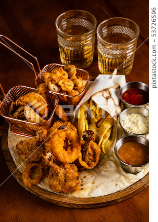 beer plate on the wooden background 53726596