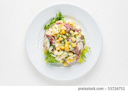 salad with corn on the white plate 53726752