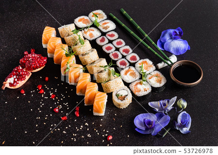 Rainbow Sushi Roll with salmon, eel, tuna, avocado, royal prawn, cream cheese Philadelphia Rainbow Sushi Roll with salmon, eel, tuna, avocado, royal prawn, cream cheese Philadelphia 53726978