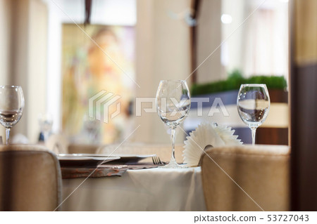 Tables set for meal 53727043