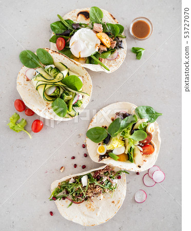 Different Kinds Salad Pitas 53727070