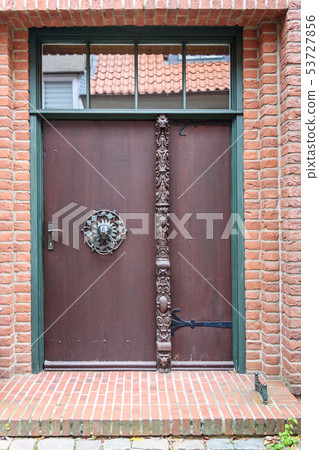Old wooden front door in house. Luneburg. Germany 53727856