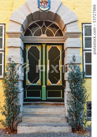 Old wooden front door in house. Luneburg. Germany Old wooden front door in house. Luneburg. Germany 53727866