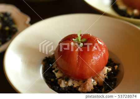 Tomatoes and ricotta cheese and olives 53728074