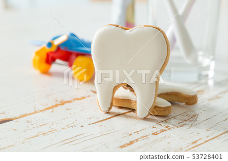 Teeth shaped cookies background Teeth shaped cookies background 53728401