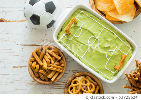 Selection of party food for watching football championship 53728624