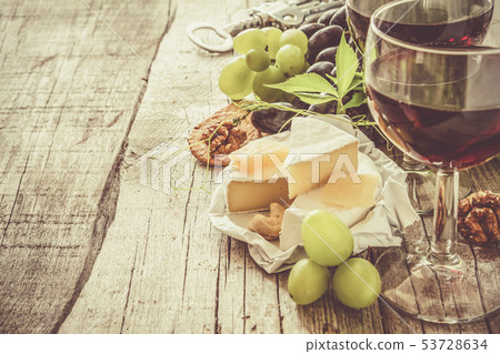 Appetizer - cheese wine grapes nuts Appetizer - cheese wine grapes nuts 53728634