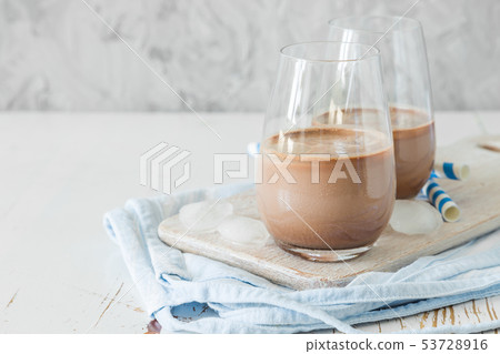 Chocolate milk in glasses 53728916