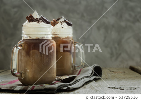 Cold coffee drink in glass jar Cold coffee drink in glass jar 53729510