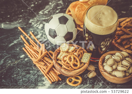 Selection of party food for watching football championship 53729622