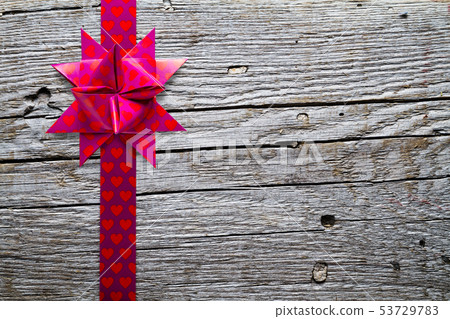 German folded star made of heart shaped ribbon 53729783