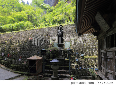 Stone Buddha in front of the Ikuzo temple on the way to the "Iwayaji" slope at the 45th place of the Shikoku Sacred Site 53730086
