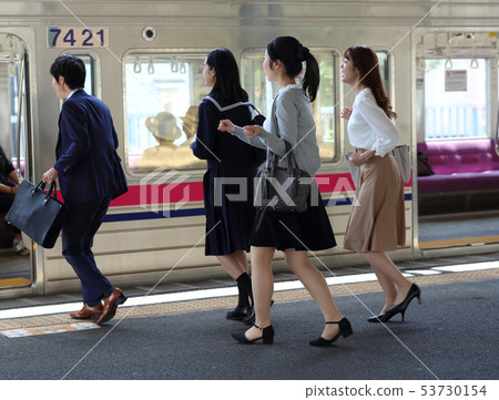 People who get on the train Photography cooperation "Keio Electric Railway Co., Ltd." People who get on the train Photography cooperation "Keio Electric Railway Co., Ltd." 53730154