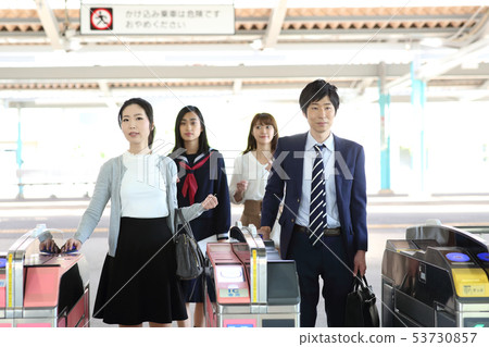 People shooting out of the ticket gate "Keioh Electric Railway Co., Ltd." 53730857