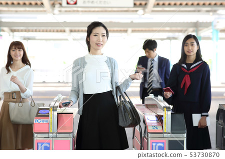People shooting out of the ticket gate "Keioh Electric Railway Co., Ltd." 53730870