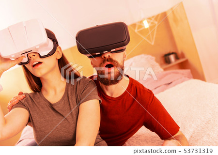Cute couple playing games while having a day off Cute couple playing games while having a day off 53731319